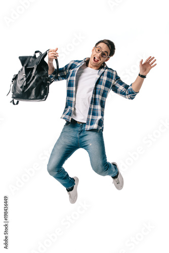 screaming student jumping with backpack isolated on white