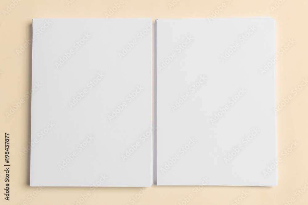 White business card on wooden table. Blank portrait A4. White business card on wooden table. Blank portrait A4.