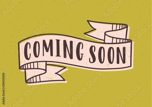 Coming Soon lettering or inscription written with modern font on elegant ribbon or tape isolated on yellow background