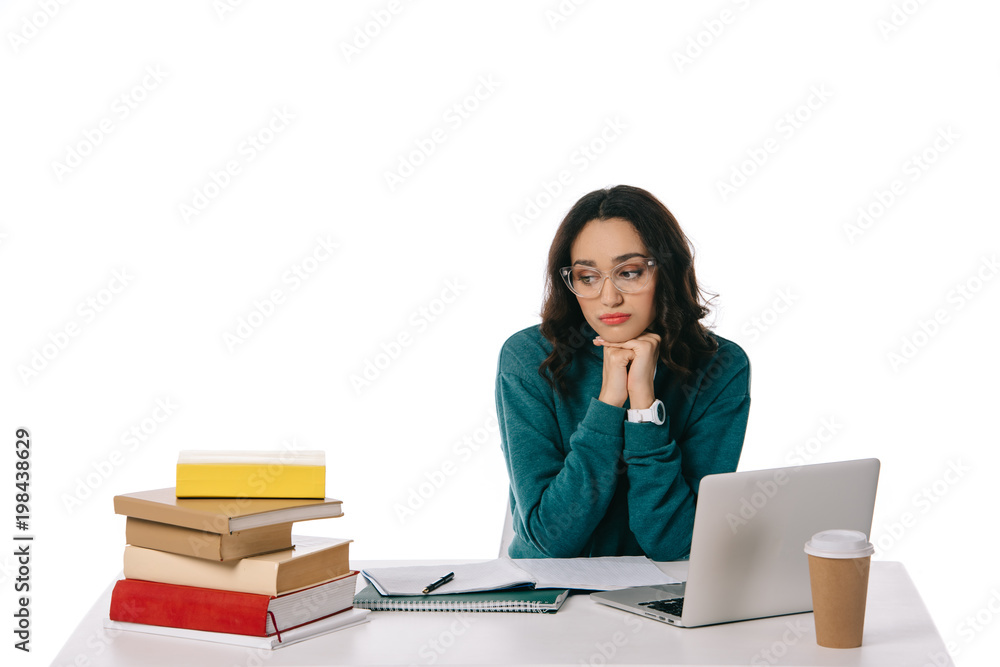 sad african american teen student looking at stack of books isolated on white sad african american teen student looking at stack of books isolated on white