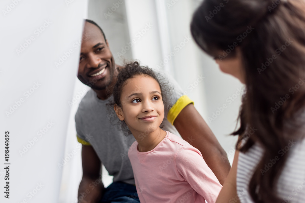 Obraz premium happy african american family spending time together