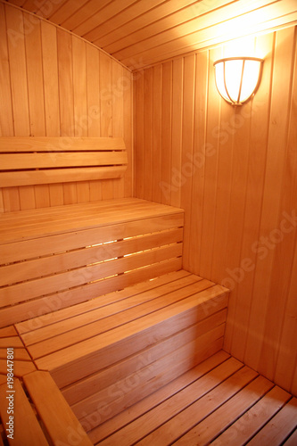 Sauna with shelves for sitting from linden boards
