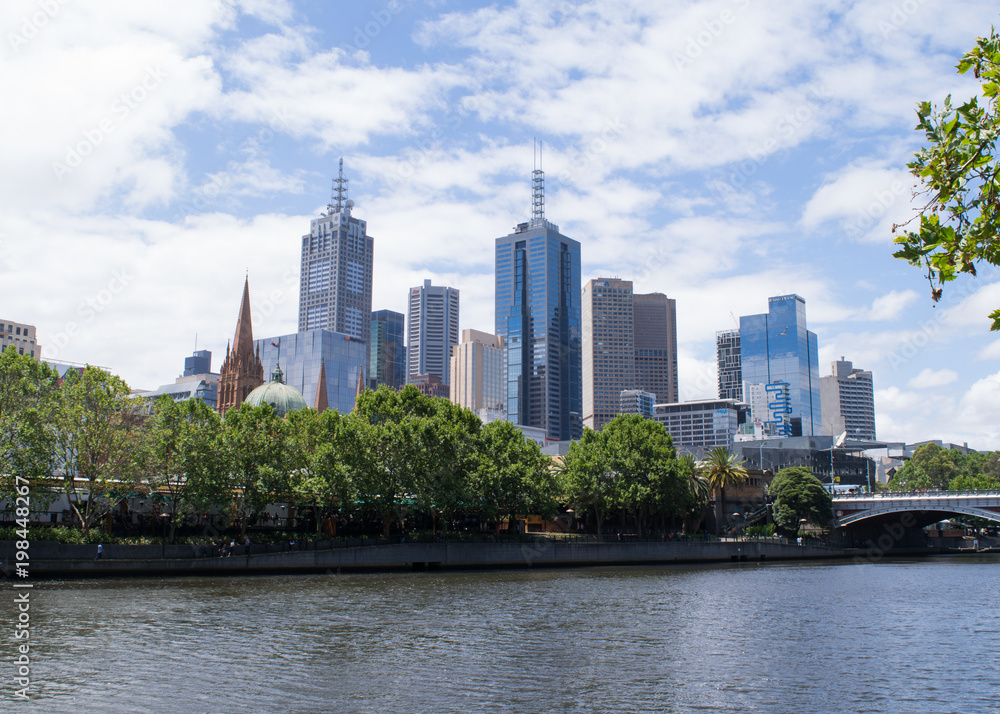 City skyscrapers across the Yarra River in Melbourne, Australia