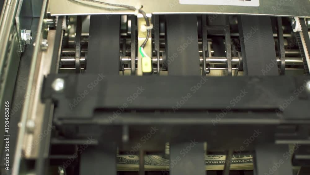Money inside ATM machine. Slider shot. Money inside ATM machine. Slider shot.