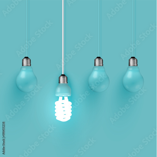 Energy saver lightbulb among old ones, vector illustration