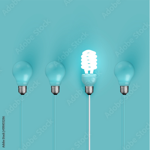 Energy saver lightbulb among old ones, vector illustration