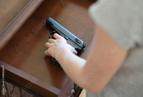 Child found pistol in drawer at home.