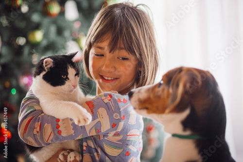 The pretty girl embarcing a cat