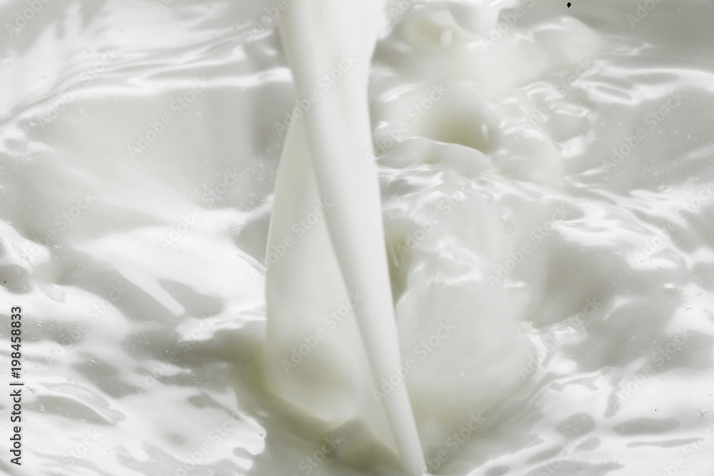 Pouring white milk Pouring white milk