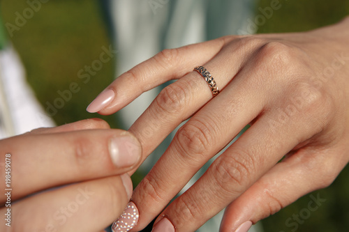 Man giving an engagement ring to his girlfriend © burdun