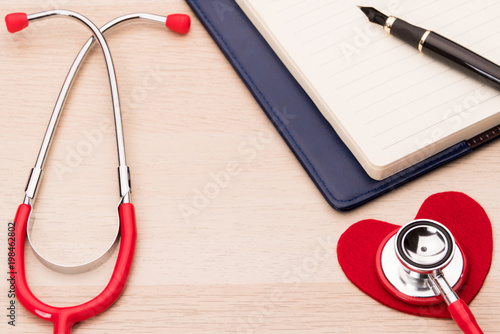 stethoscope and red heart symbol, healthcare and medicine, healthy and insurance, world health day concept photo