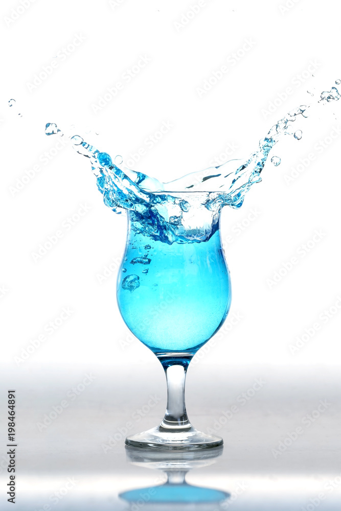water splash in glasses on white background