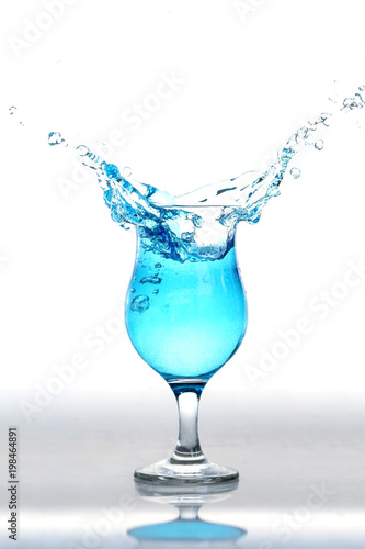 water splash in glasses on white background