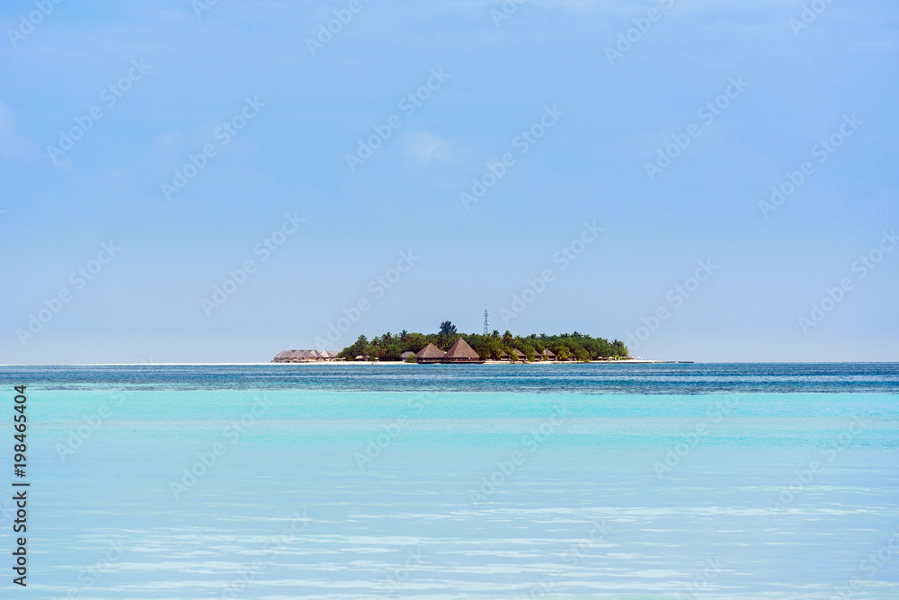 View of the tropical island of the Caribbean Sea, Maldives. Copy space for text.