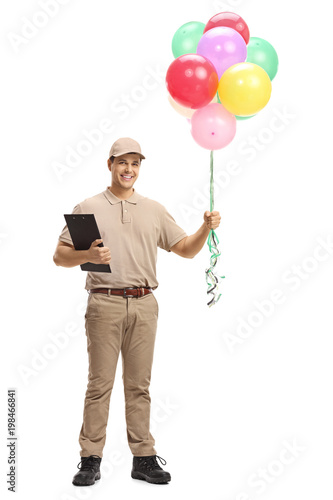 Delivery man with a clipboard and balloons