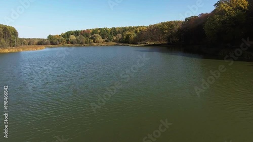 Wallpaper Mural Lake background over blue sky, autumn forest Torontodigital.ca