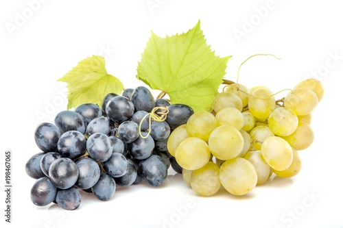 White And Red Grape Clusters With Leaves
