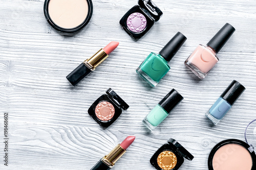 Fotografie set of decorative cosmetics on wooden table background top view