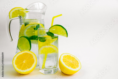 Summer refreshing mojito in a glass on a white background