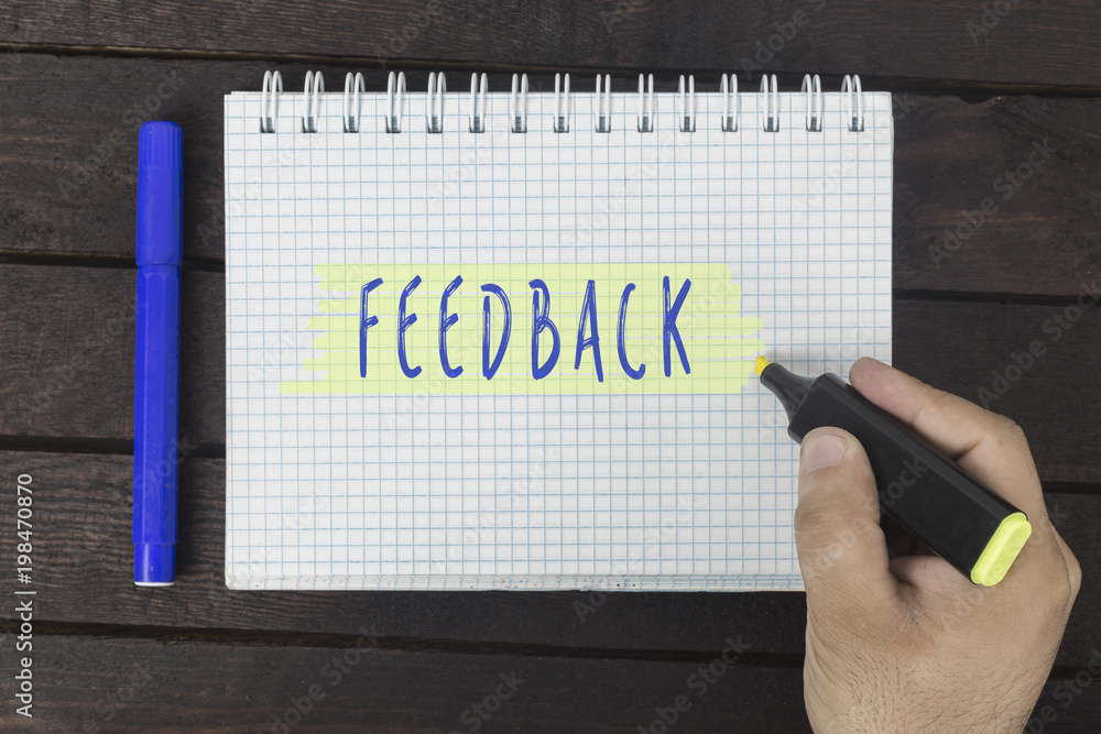 hand writing on notepad: Feedback hand writing on notepad: Feedback