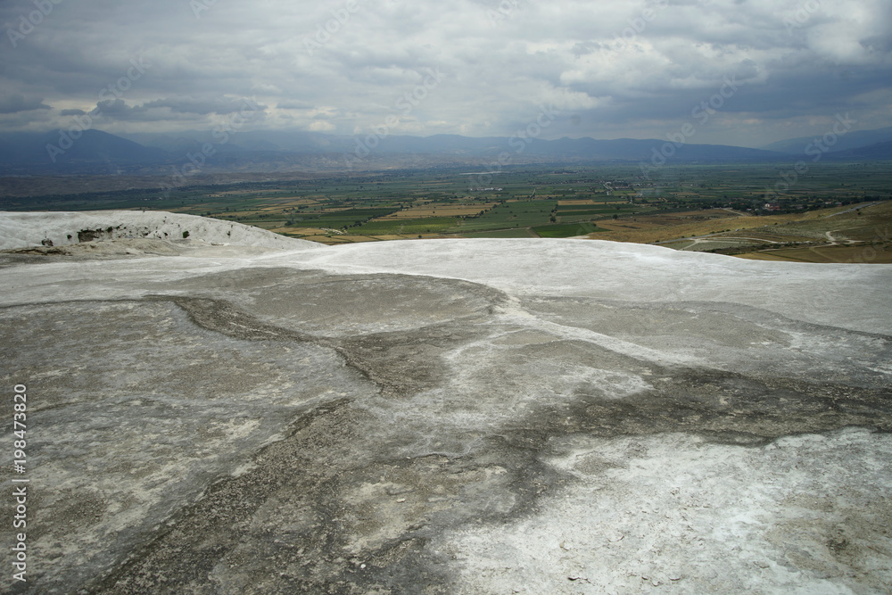 The dramatic view of Travertine Pamukkale. Turkey. The dramatic view of Travertine Pamukkale. Turkey.