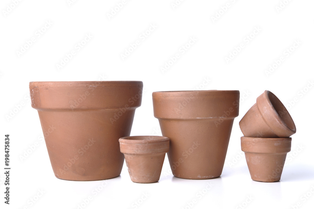 group of old terra cotta pots isolated on white background group of old terra cotta pots isolated on white background