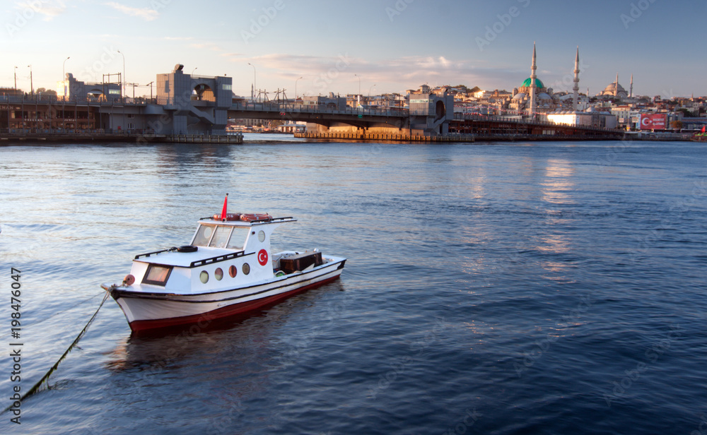 Boat in front of Galata Bridge, Istanbul Boat in front of Galata Bridge, Istanbul