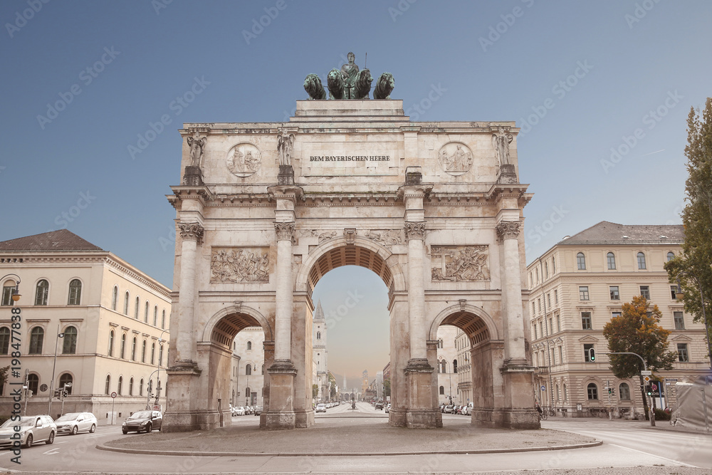 The Siegestor in Munich, Germany. Victory Gate, triumphal arch crowned with a statue of Bavaria with a lion-quadriga. Located between the Ludwig Maximilian University and the Ohmstrasse.
