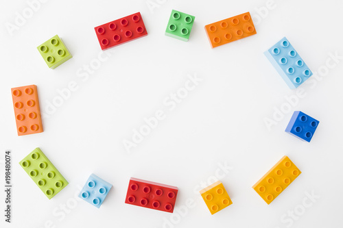 colorful toy bricks on white background