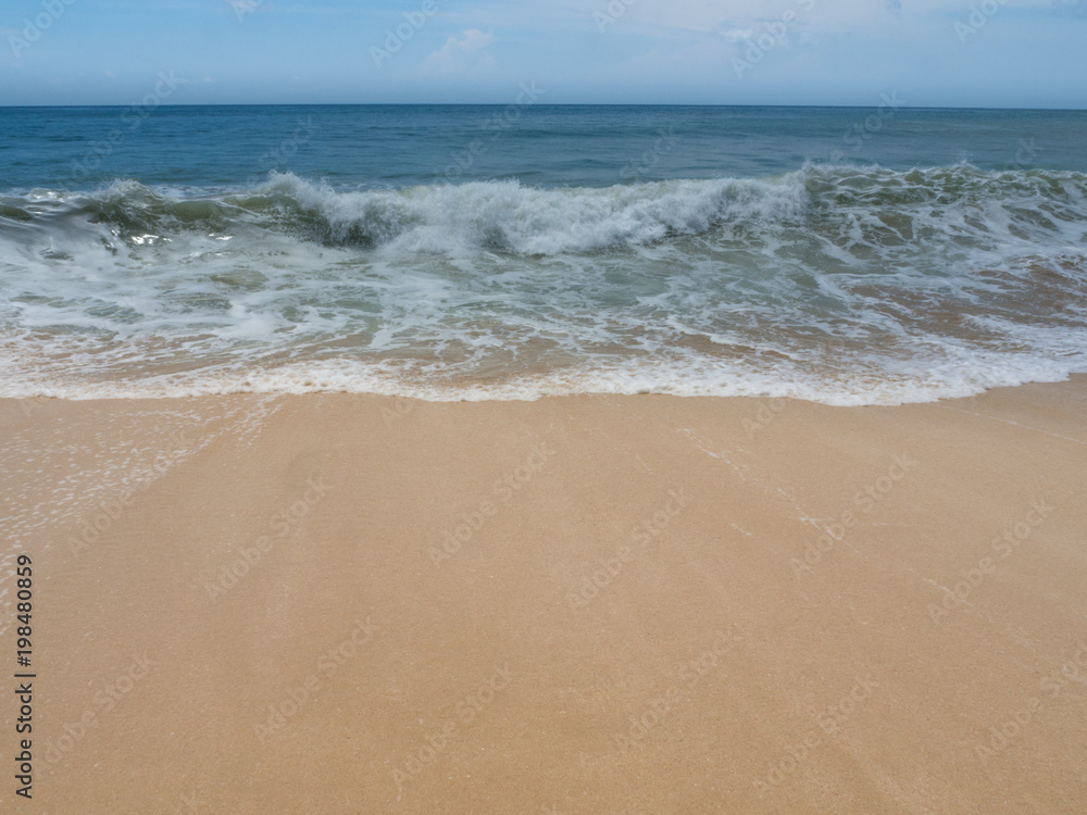 Azure beach with clear water of Indian ocean at sunny day A view of a cliff in Bali, Indonesia