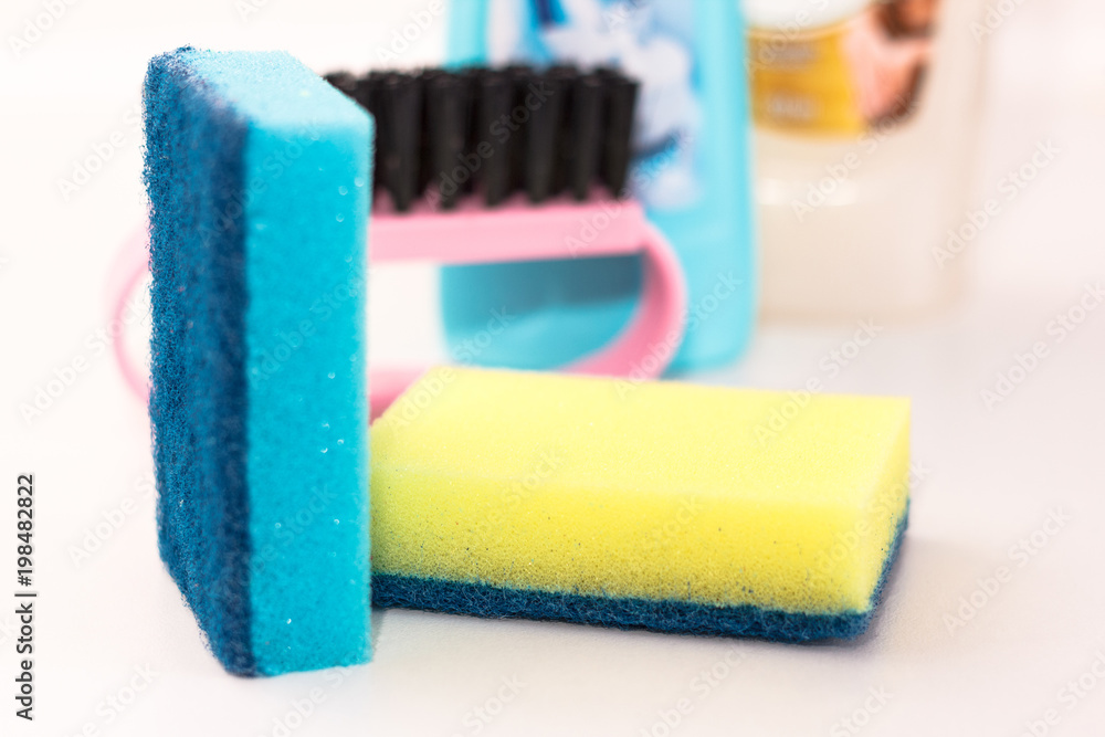 Sponges, cleaning items on a white background