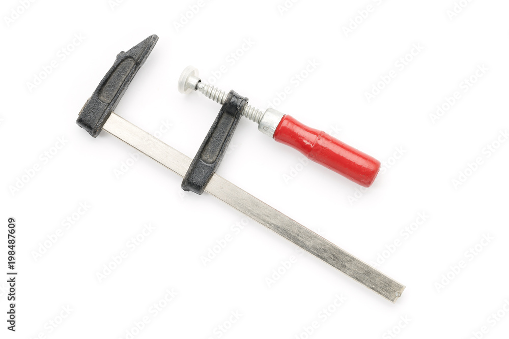old used screw clamp isolated on white old used screw clamp isolated on white