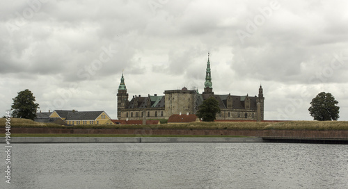 View of the medieval castle with a lake