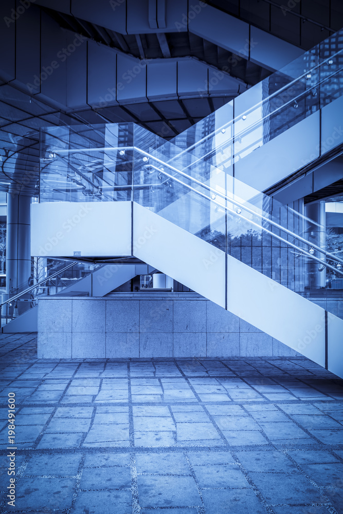 Obraz premium A staircase with a blue background