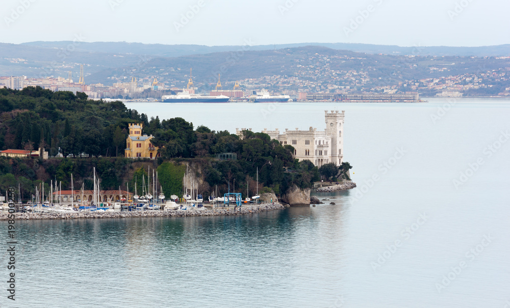 Naklejka premium Miramare Castle near Trieste in a Winter Late Afternoon