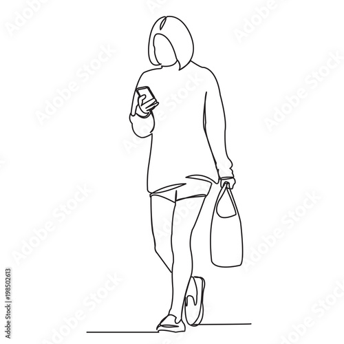 the girl is reading the phone