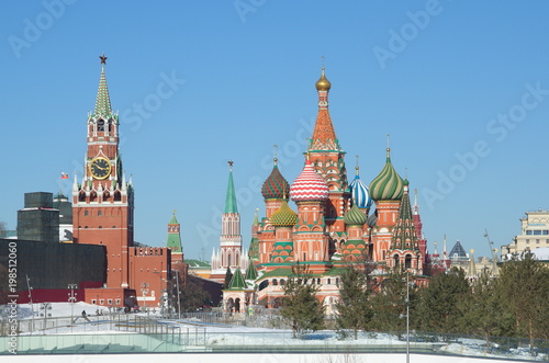 Moscow, Russia - March 19, 2018: Landscape Park "Zaryadye" in the center of Moscow, Russia. View of St. Basil's Cathedral and the towers of the Moscow Kremlin on a Sunny day