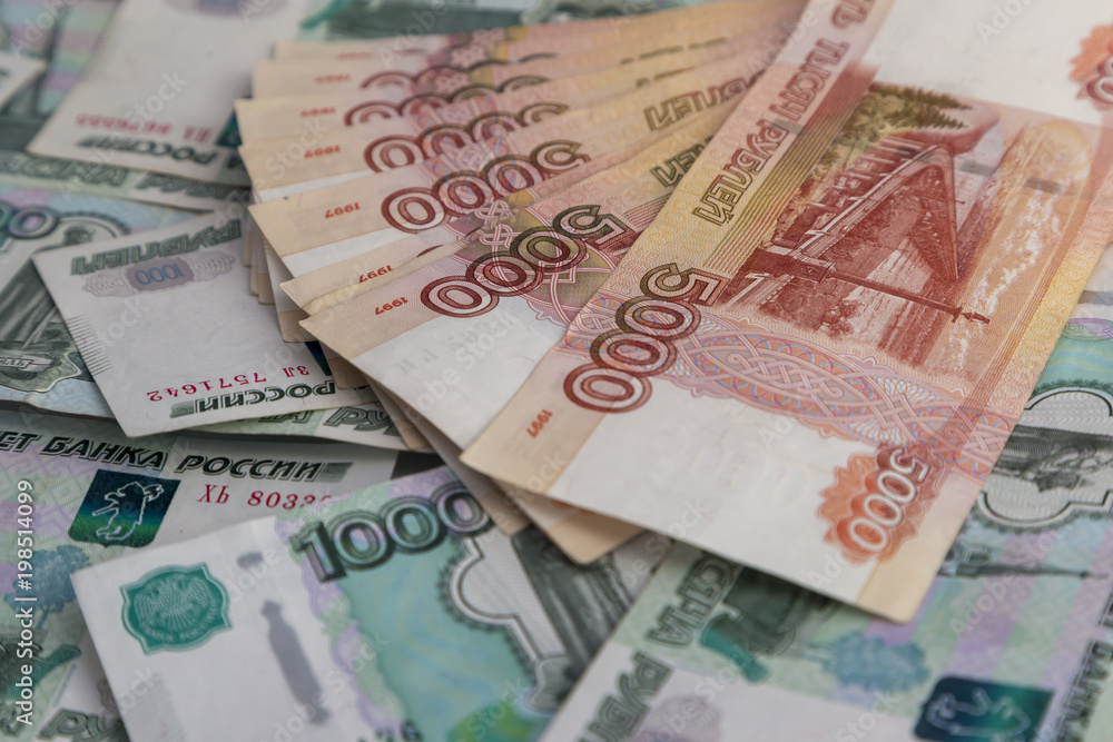 Russian money. Fan of banknotes 1000 rubles, 5000 rubles Russian money. Fan of banknotes 1000 rubles, 5000 rubles