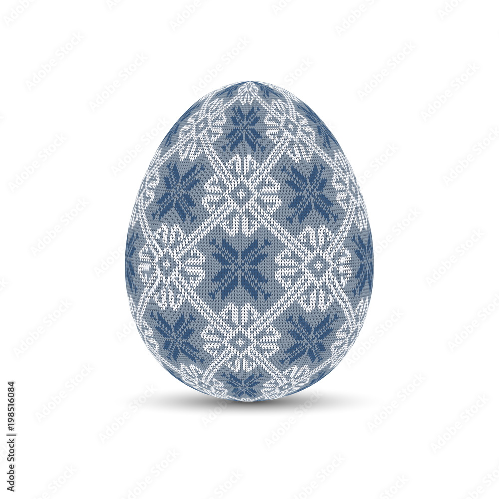 Easter egg with a knitted Scandinavian pattern. Knitted easter egg Easter egg with a knitted Scandinavian pattern. Knitted easter egg