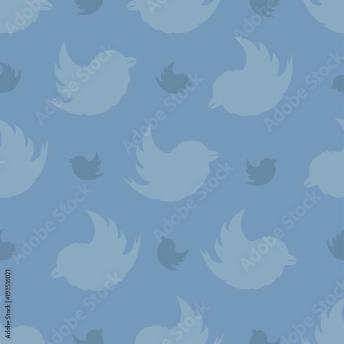 Seamless pattern from birds on a on a on a pastel blue background. The Bullfinch Pattern