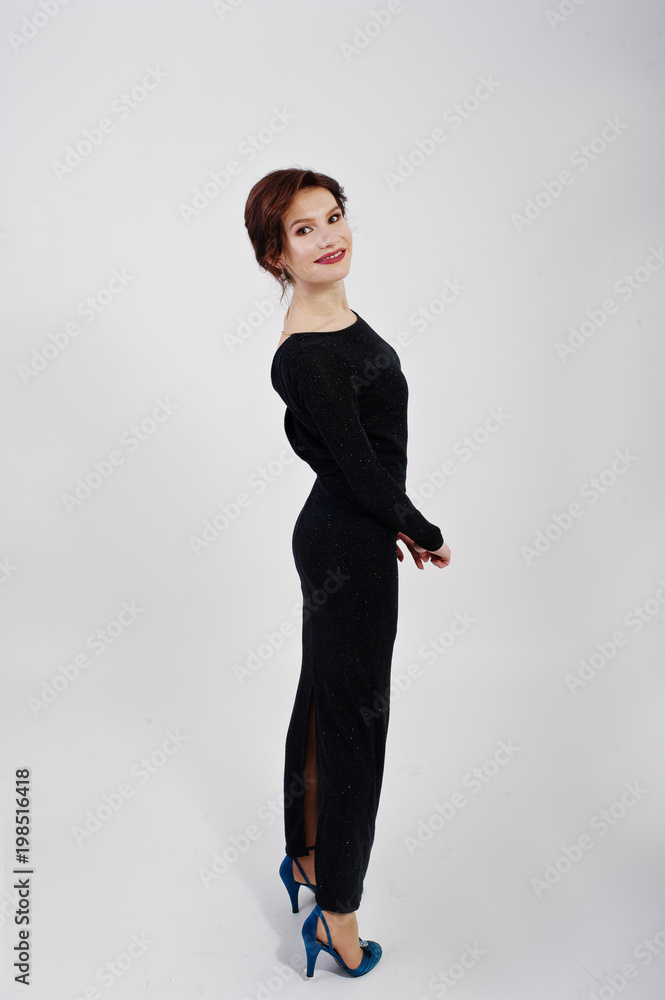 Elegance woman in black evening dress posed on studio isolated on white. Elegance woman in black evening dress posed on studio isolated on white.