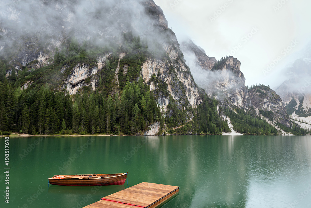 lake with boats in Italian mountain, Lago di Braies