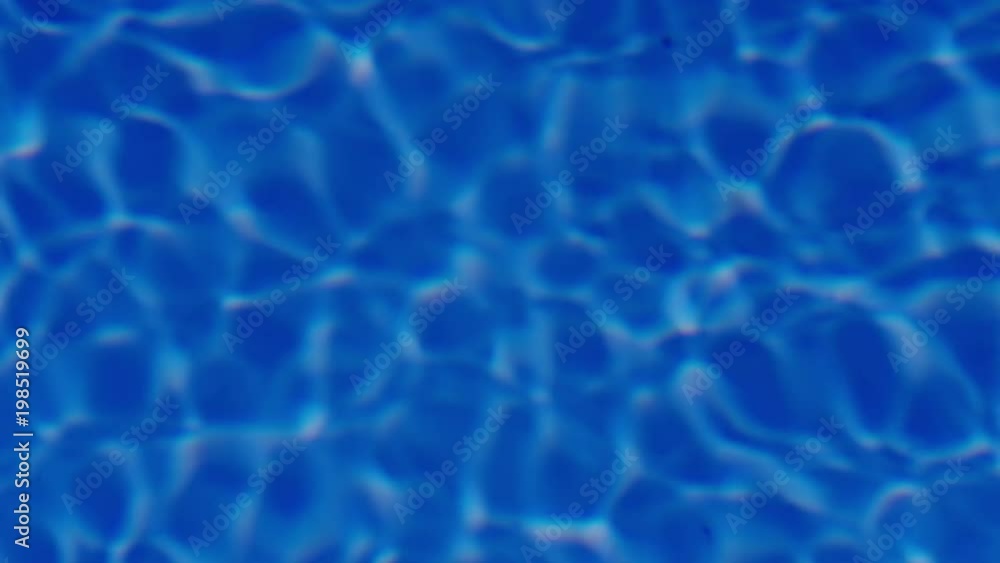Background of rippled pattern of clean water in a blue swimming pool, Germany, Aug 2017 Background of rippled pattern of clean water in a blue swimming pool, Germany, Aug 2017