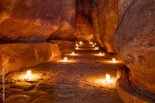 lighting candles in canyon in Jordan