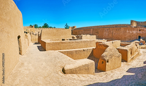 Among the ruins of adobe fortress, Rayen, Iran photo