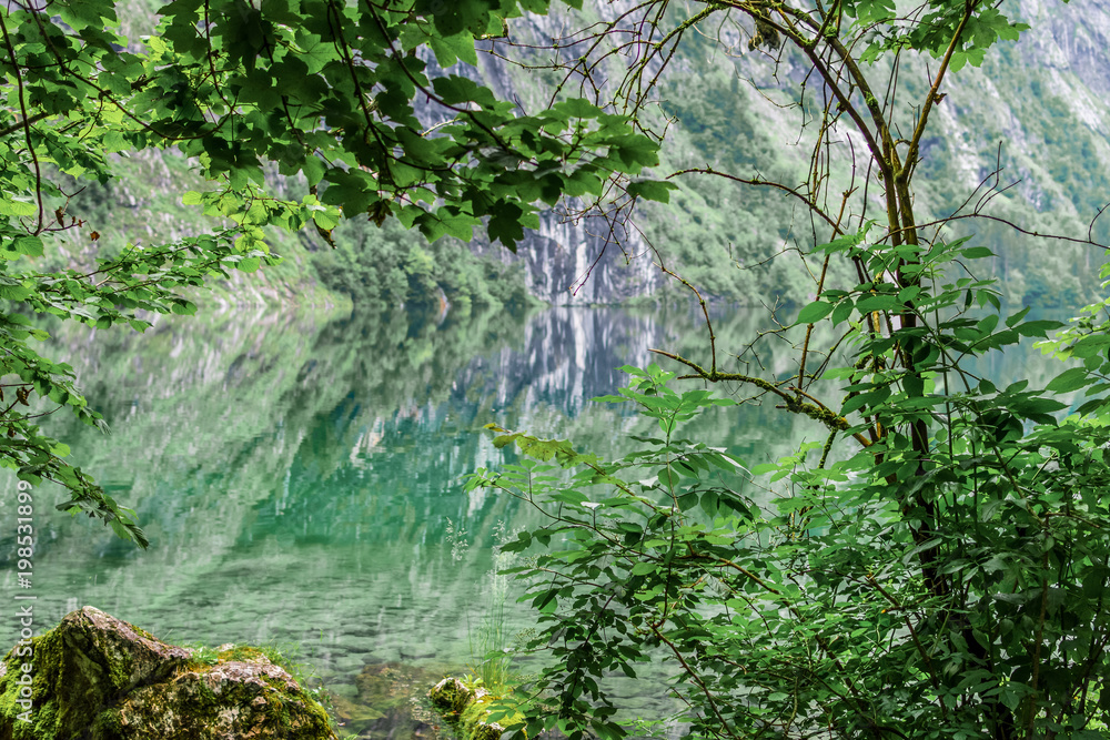 Great summer panorama of the Obersee lake. Green morning scene of Swiss Alps, Nafels village location, Switzerland, Europe. Beauty of nature concept background.