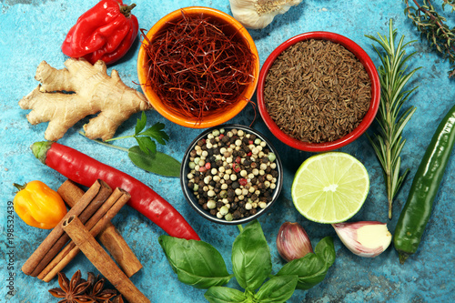 Fototapeta Naklejka Na Ścianę i Meble -  Spices and herbs on table. Food and cuisine ingredients.