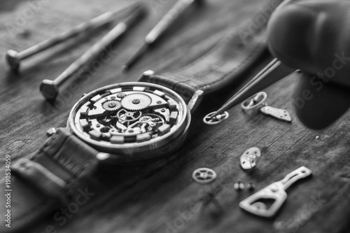 Process of installing a part on a mechanical watch, watch repair