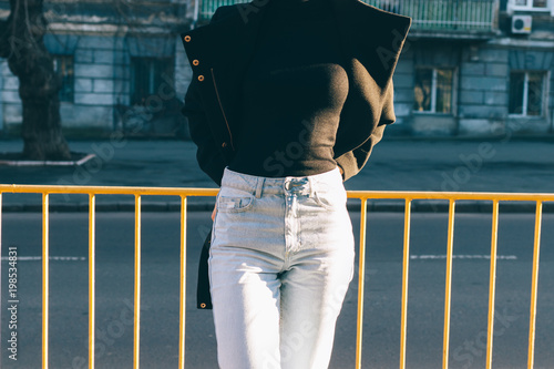 Street fashion high waisted jeans photo