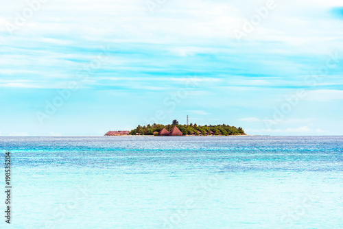 View of the tropical island of the Caribbean sea, Maldives. Copy space for text © ggfoto